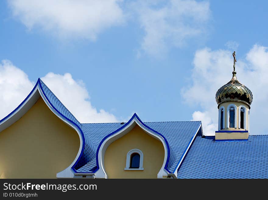 Blue roof of church against the sky background. Blue roof of church against the sky background