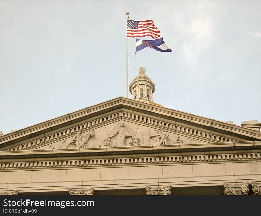 American and Colorado flags on Capitol State building, Denver, Colorado, USA. American and Colorado flags on Capitol State building, Denver, Colorado, USA