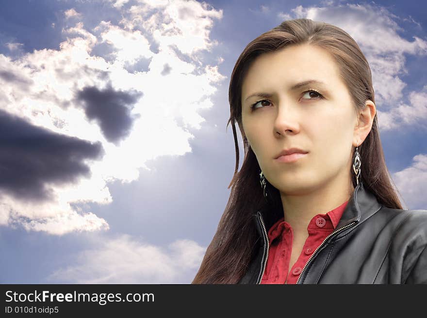 Portrait of beautiful business woman against sky background. Portrait of beautiful business woman against sky background