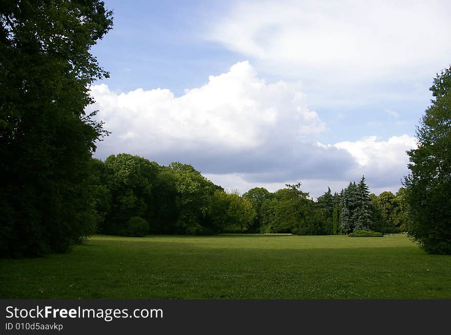 View over green park meadow brings optimistic feeling. View over green park meadow brings optimistic feeling