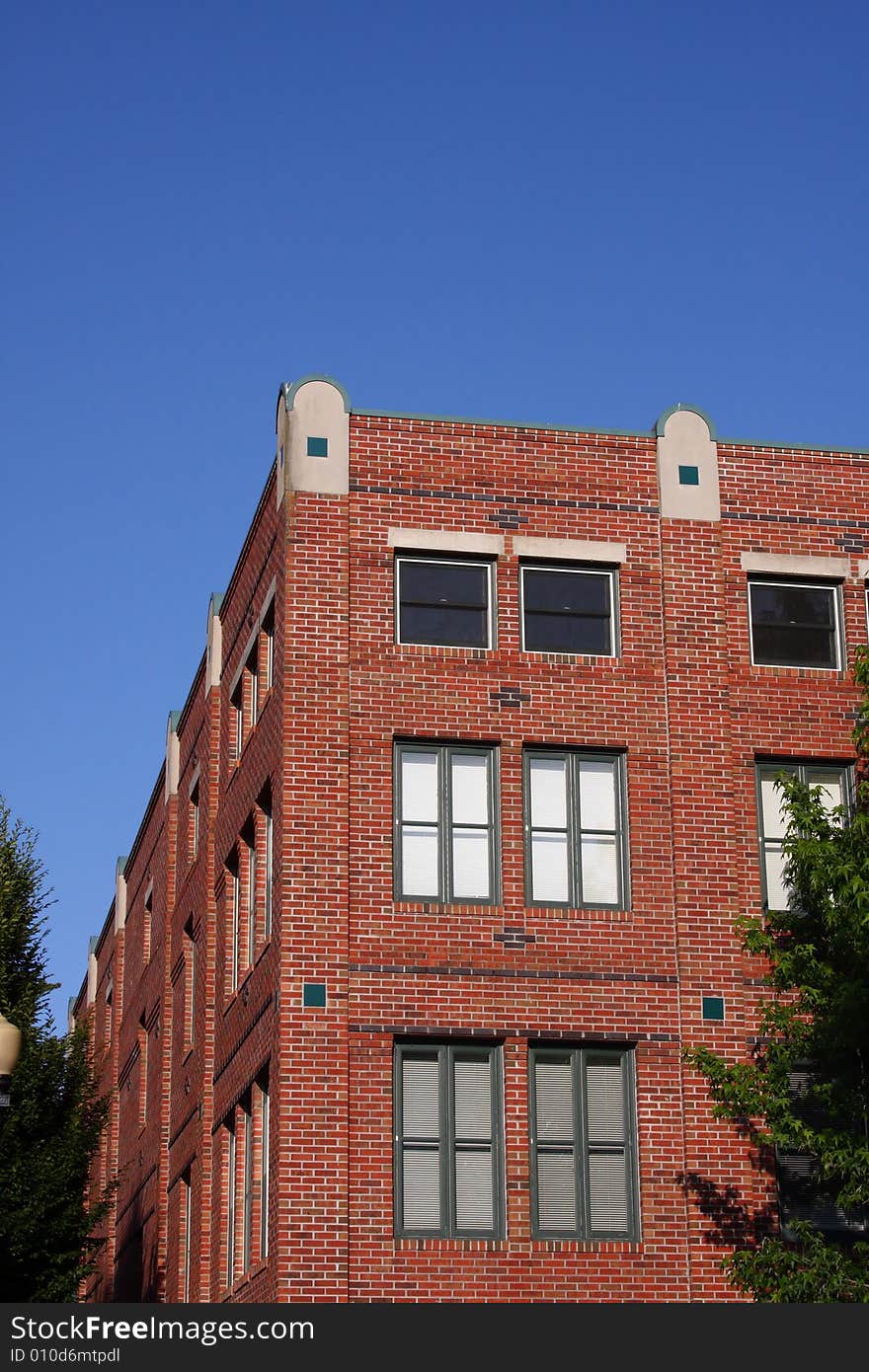 Brick Building Corner with Blue Sky background. Brick Building Corner with Blue Sky background