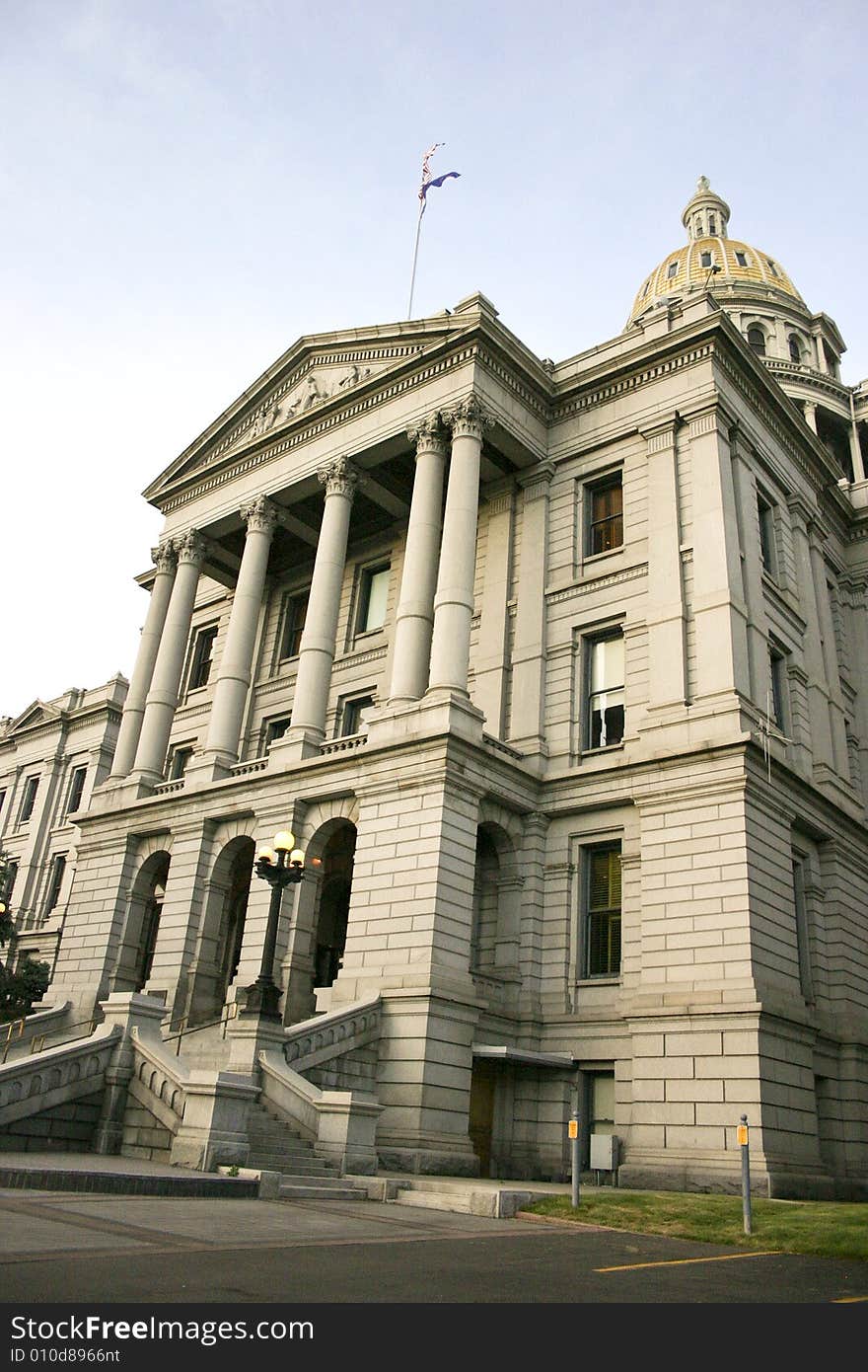 American and Colorado flags on Capitol State building, Denver, Colorado, USA