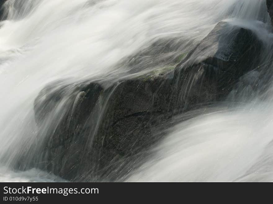 Soft Water Spilling Over Rocks