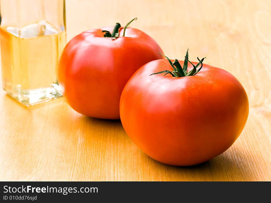 Two tomatoes  .a close up shot