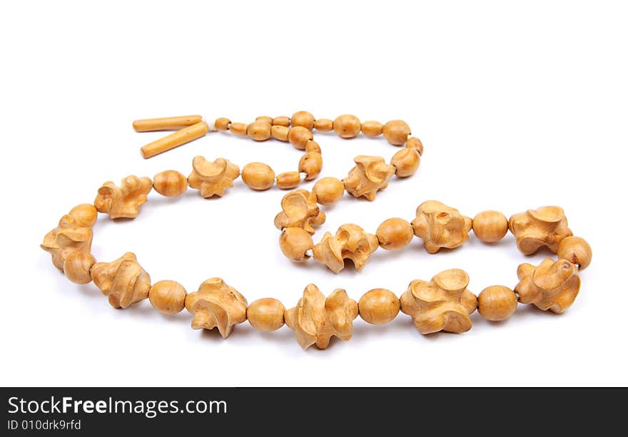 Wooden beads on a white background