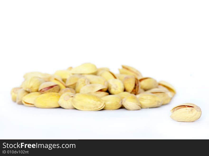 Isolated pistachios on a white background