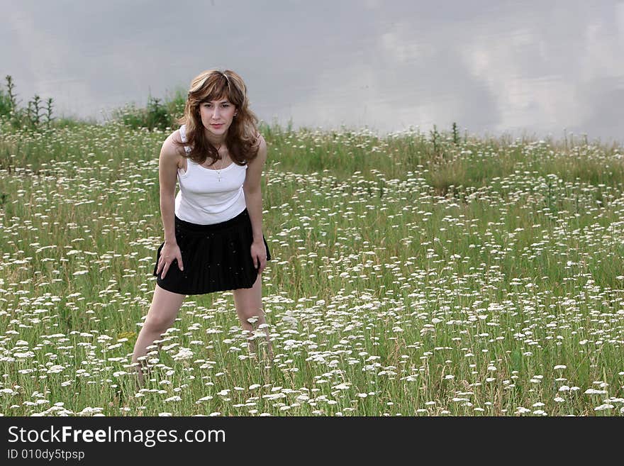 Girl In A Filed Of Flowers