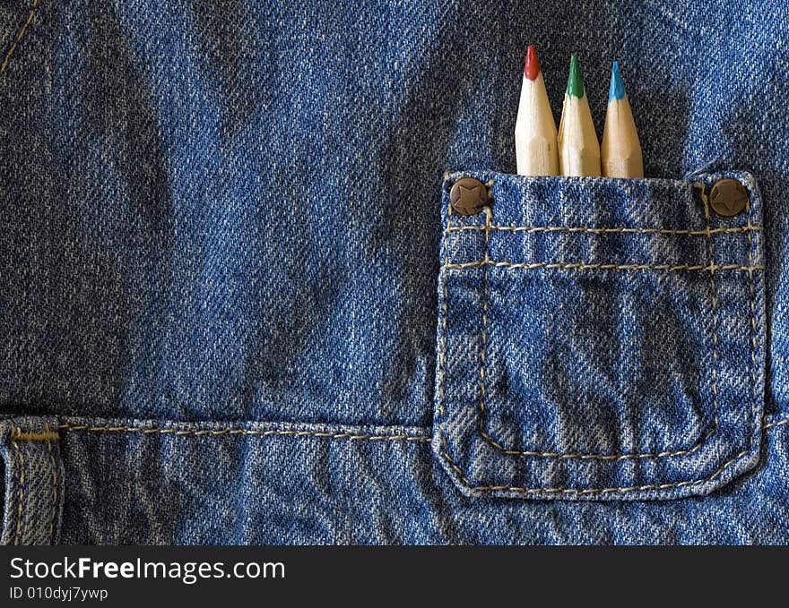 Colors pencil on blue jeans kid pocket