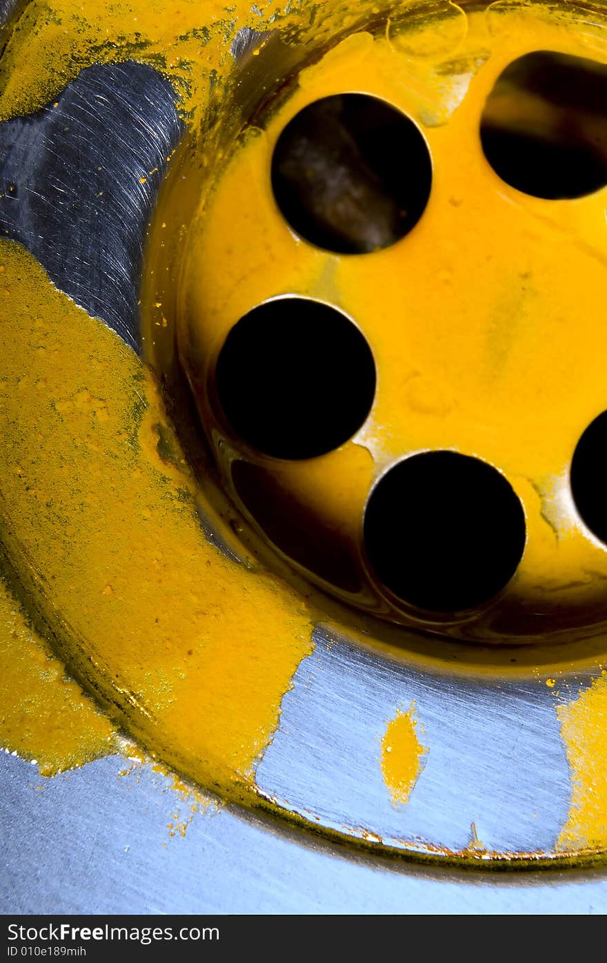 Macro of sink with yellow liquid substance. Macro of sink with yellow liquid substance