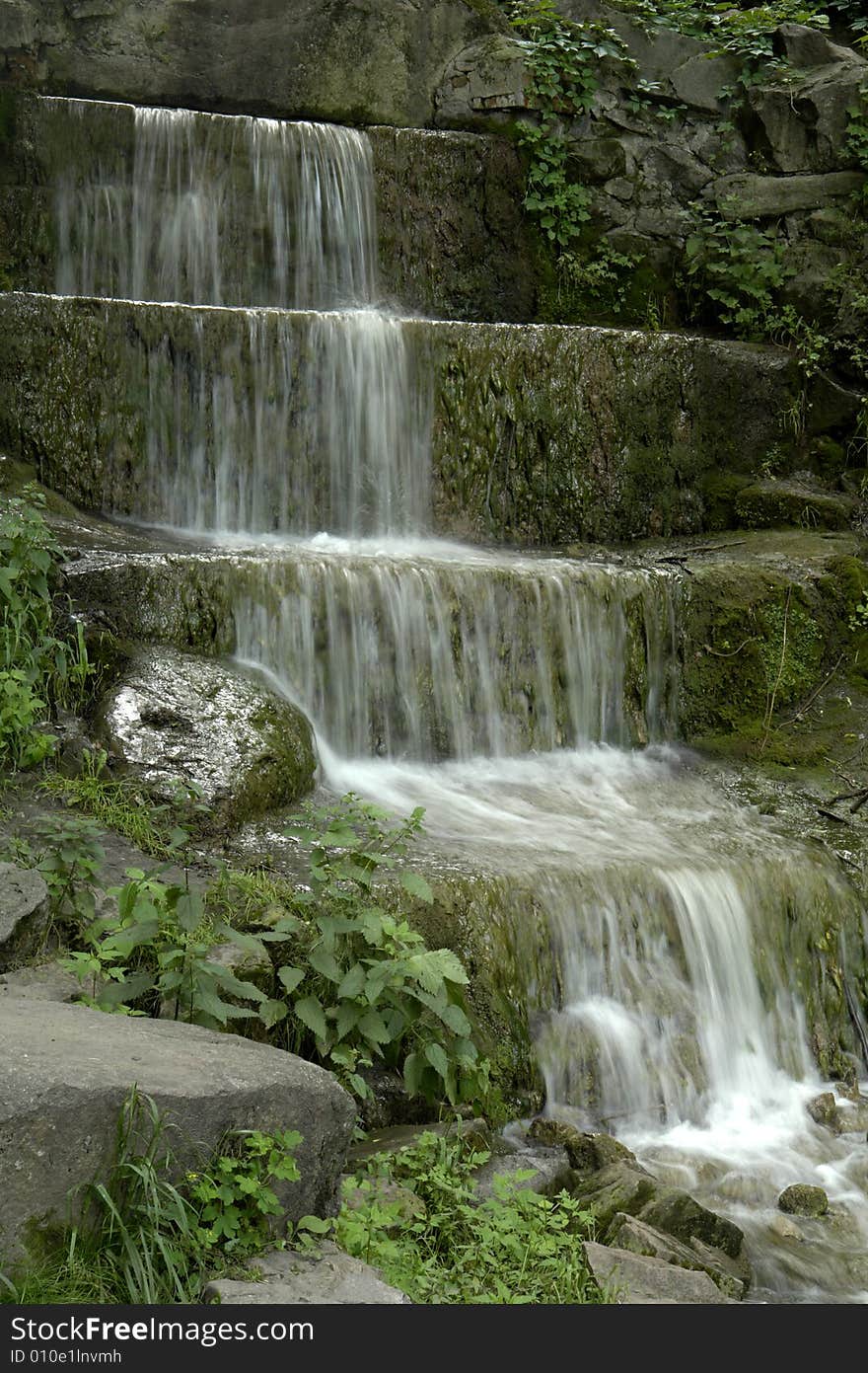 Water on a background of rocks. Water on a background of rocks