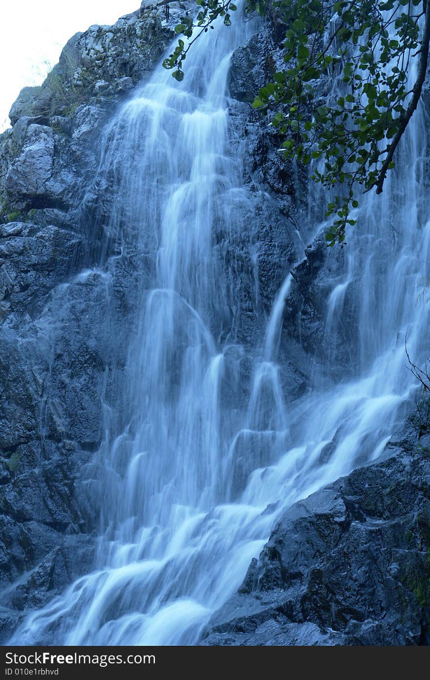 Water on a background of rocks. Water on a background of rocks