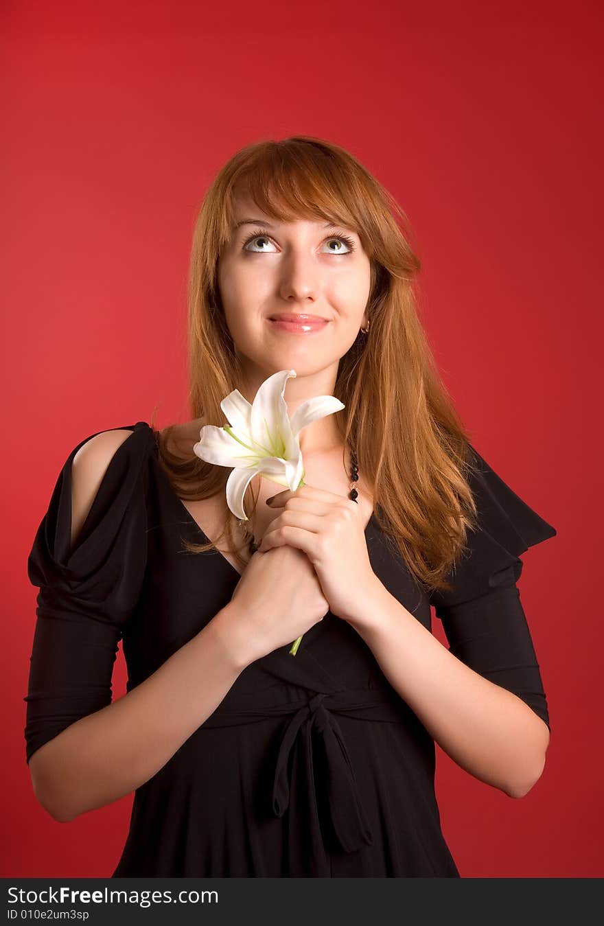 Romantic girl with orchid flower in hands. Romantic girl with orchid flower in hands