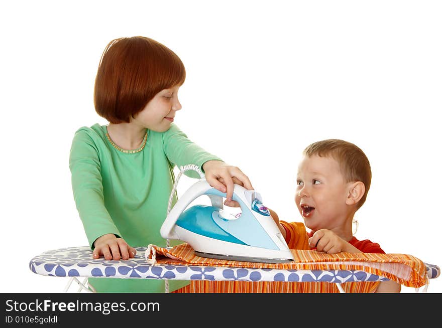 Children iron linen. Photo on a white background