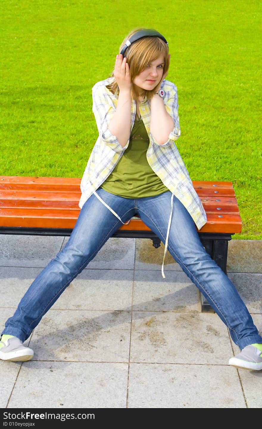 The Young Girl With Headphones