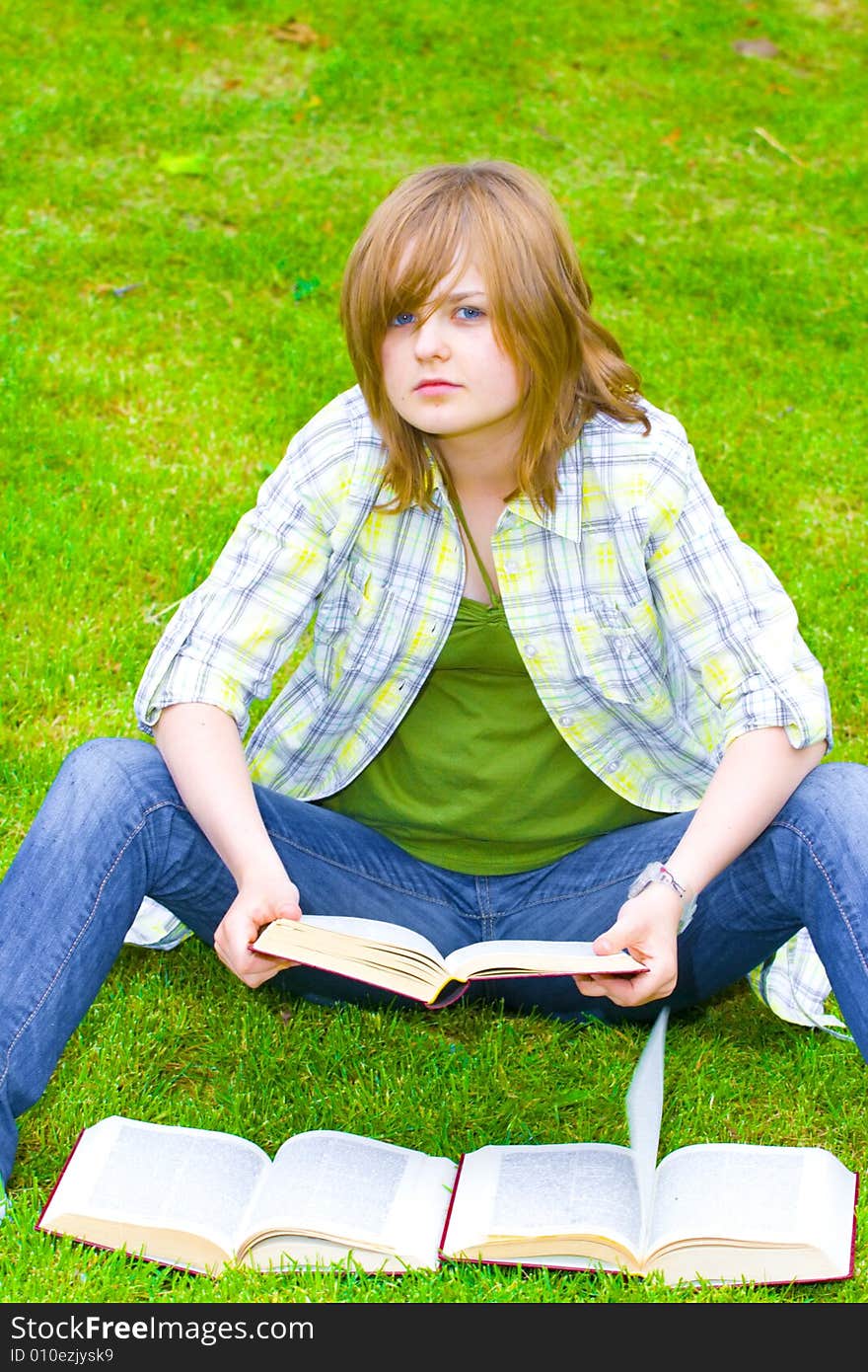 Education concept:Young student with the books