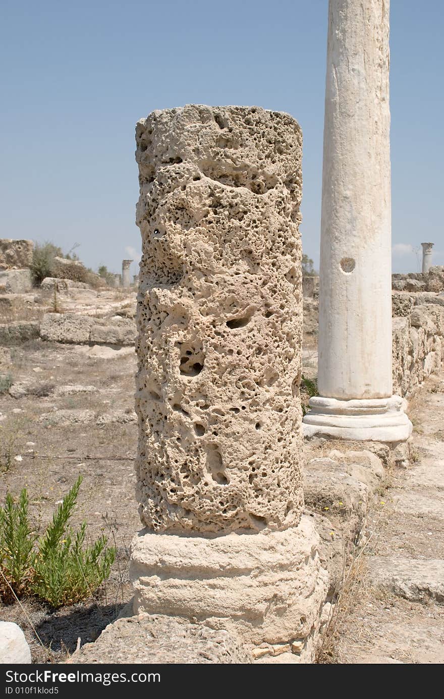 Antiquities ruins of column in ancient cyprus