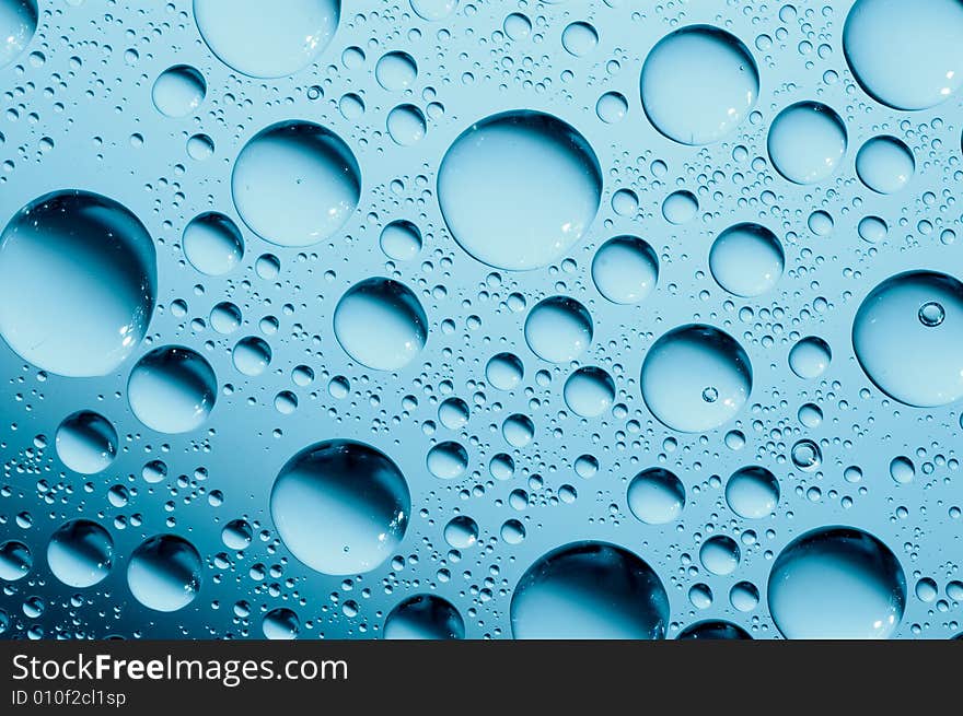 Water drops on glass. Macrophoto.