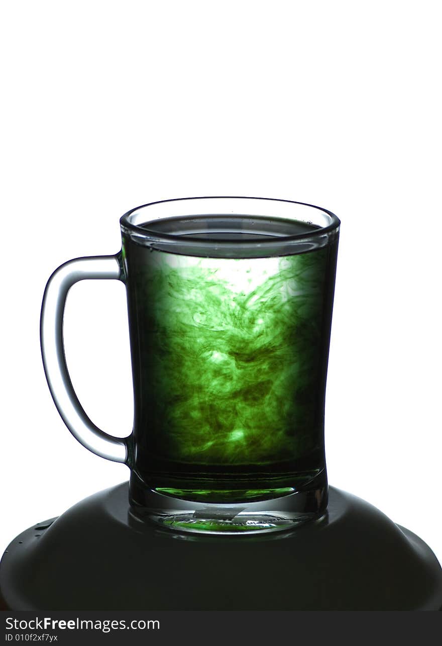 Mug with a green liquid