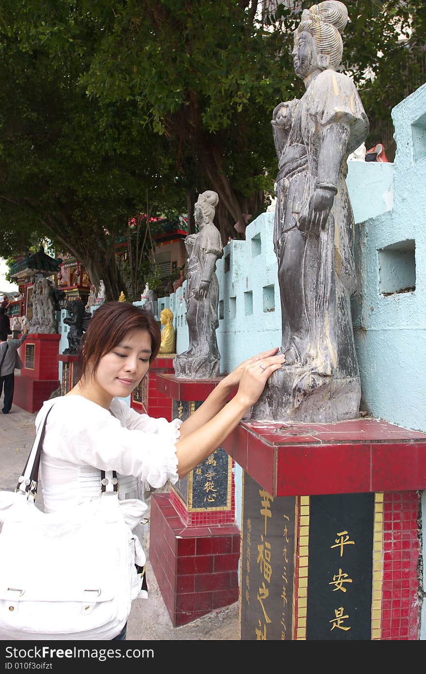 Taken in Hongkong at the beach. On the picture is also the buddha, who brings people health and safty. Taken in Hongkong at the beach. On the picture is also the buddha, who brings people health and safty.