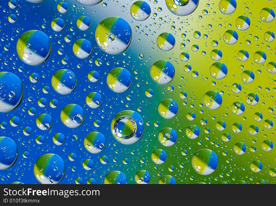 Water drops on glass. Photo on a white background