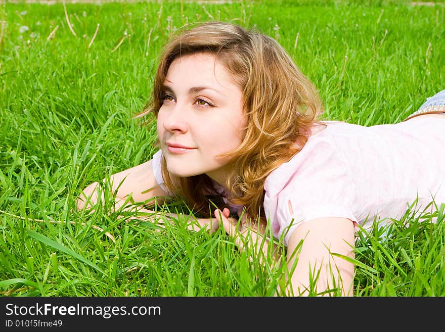 Sweet woman rest on the grass