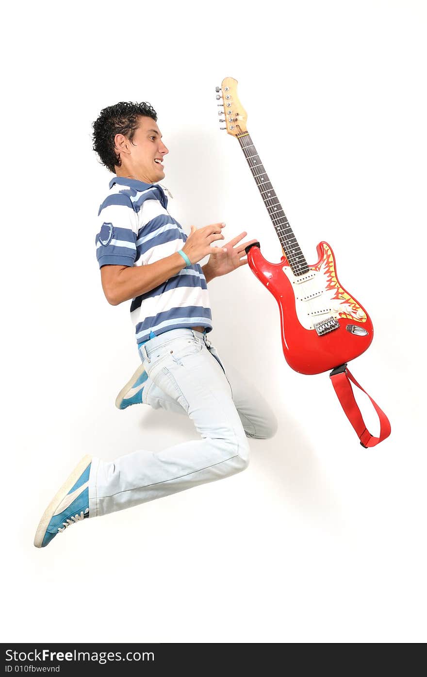 Portrait of crazy teen jumping with electric guitar - isolated. Portrait of crazy teen jumping with electric guitar - isolated