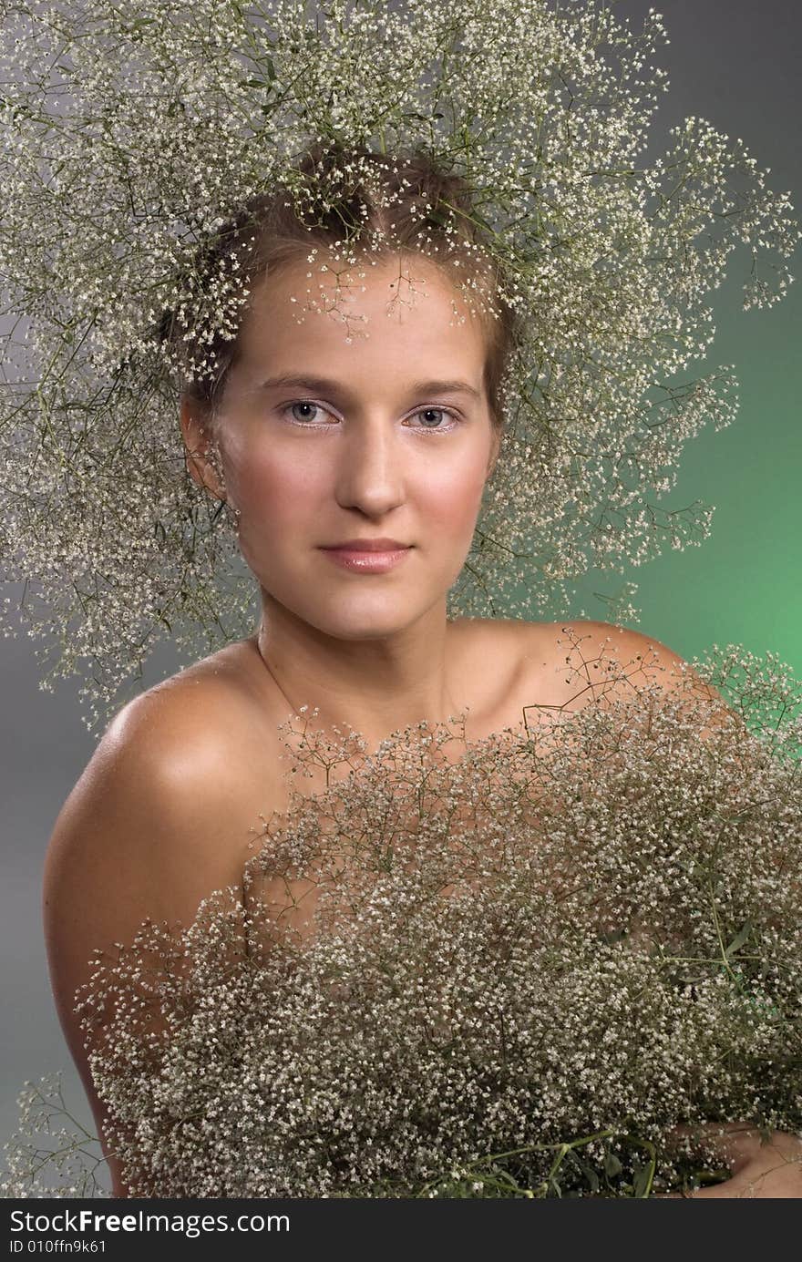 Portrait of beautiful slavic young girl with wreath