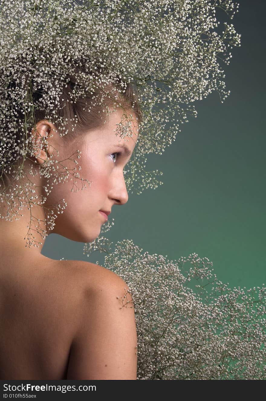 Portrait of beautiful slavic young girl with wreath