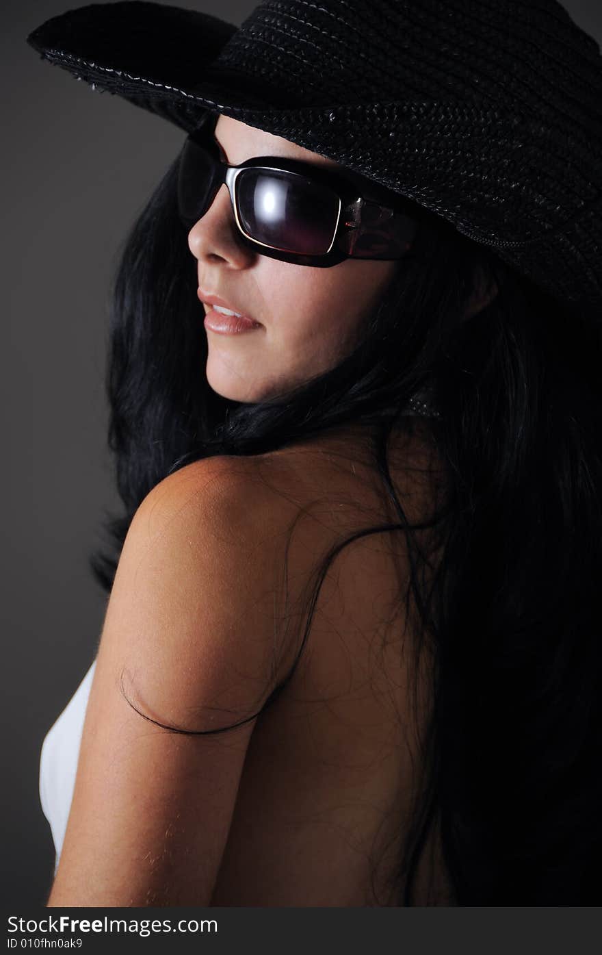 Portrait of hispanic woman wearing sunglasses