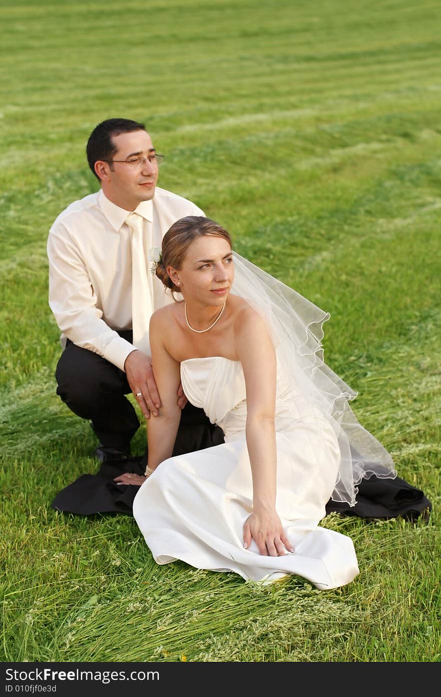 Young couple  in open air, photographic session. Young couple  in open air, photographic session