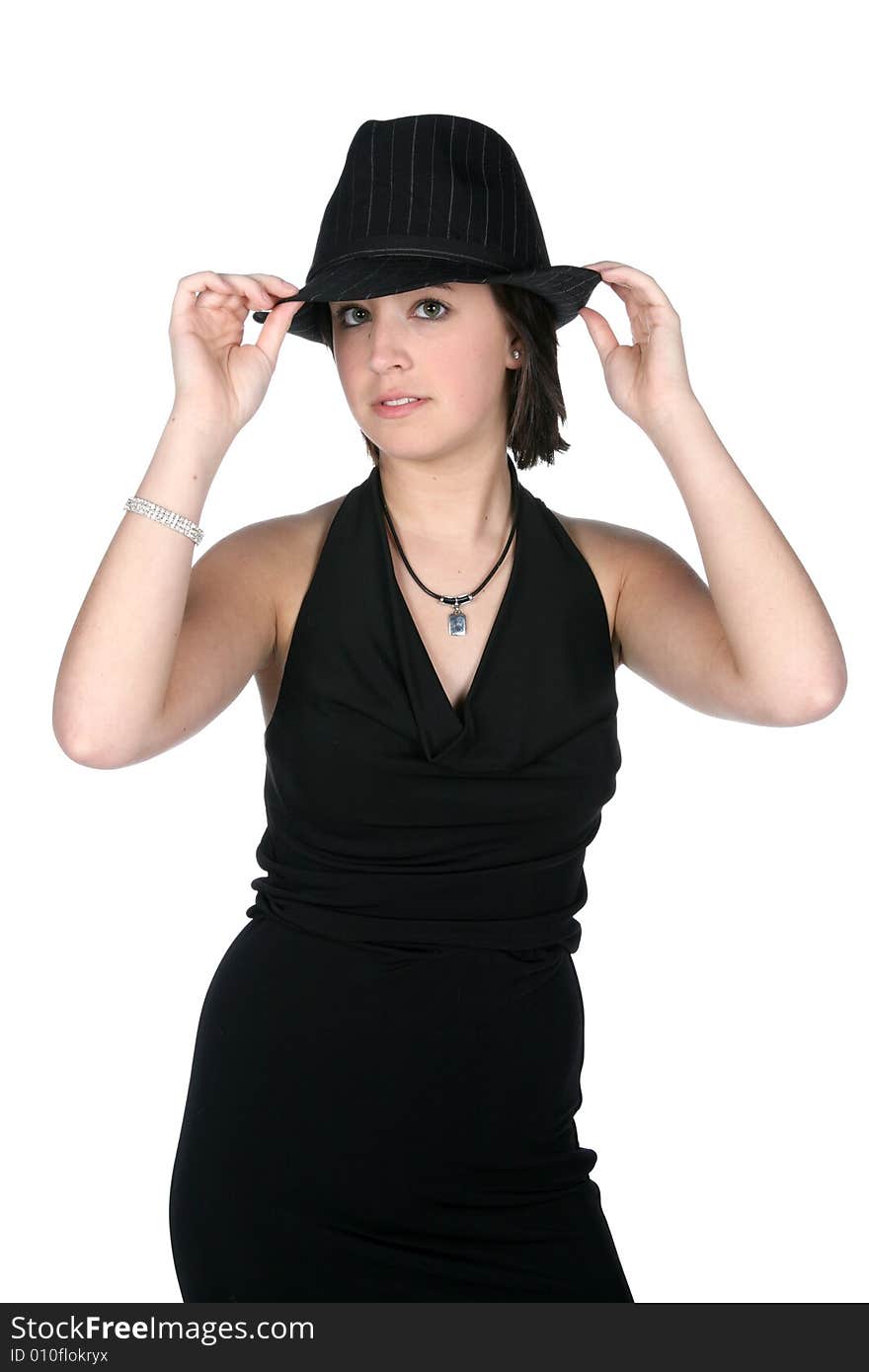 Teenage girl in slim black dress and top hat, looking cute