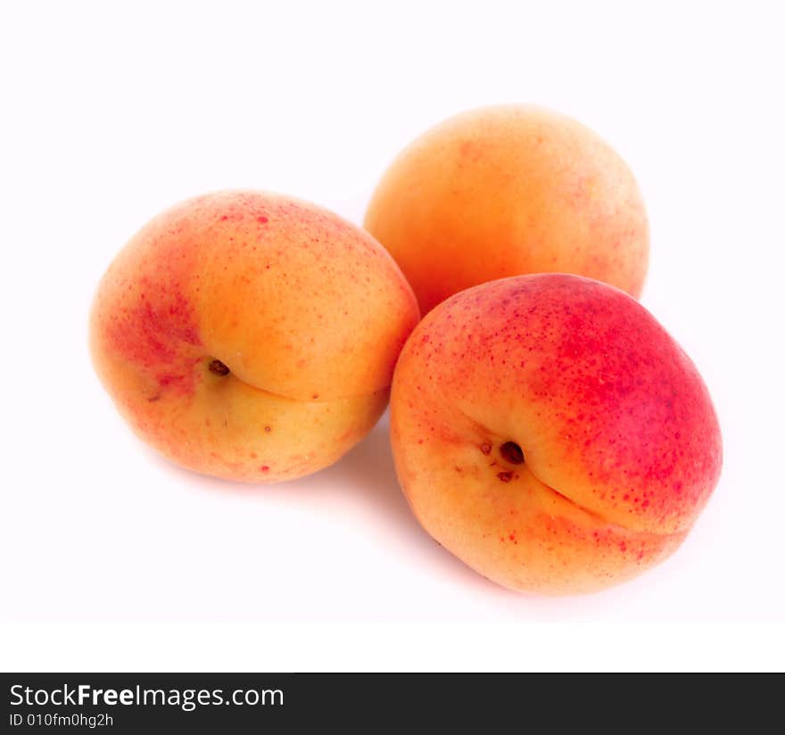 Close-up of three colorful apricots. Close-up of three colorful apricots