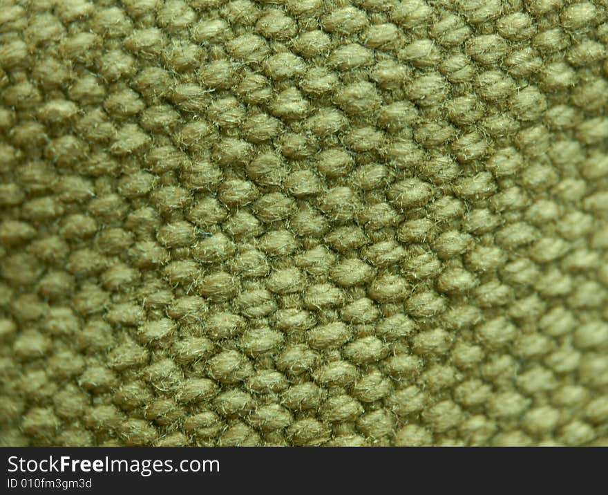 Macro pattern of pretty used green burlap