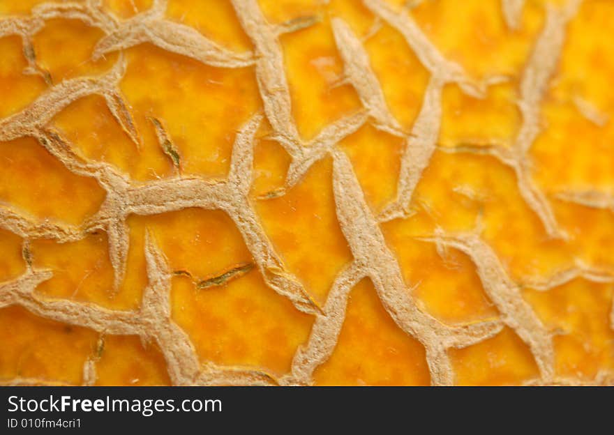 Macro of gold wrinkled melon's surface. Macro of gold wrinkled melon's surface