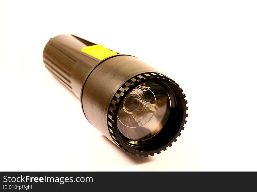 A flashlight isolated with a white background.