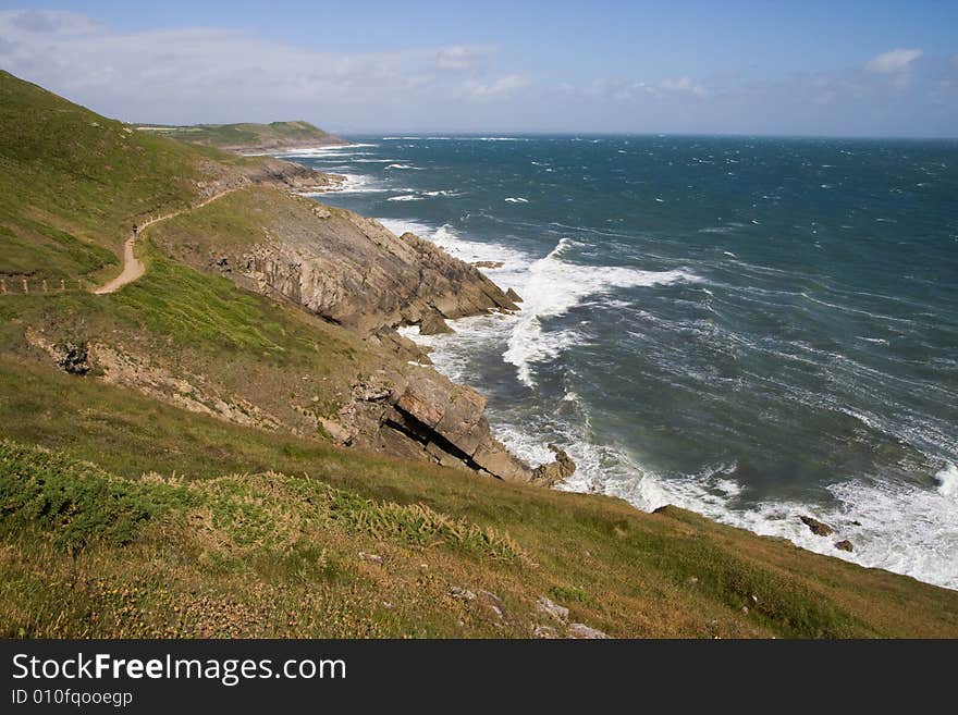 Angry waves hitting the rocky beach