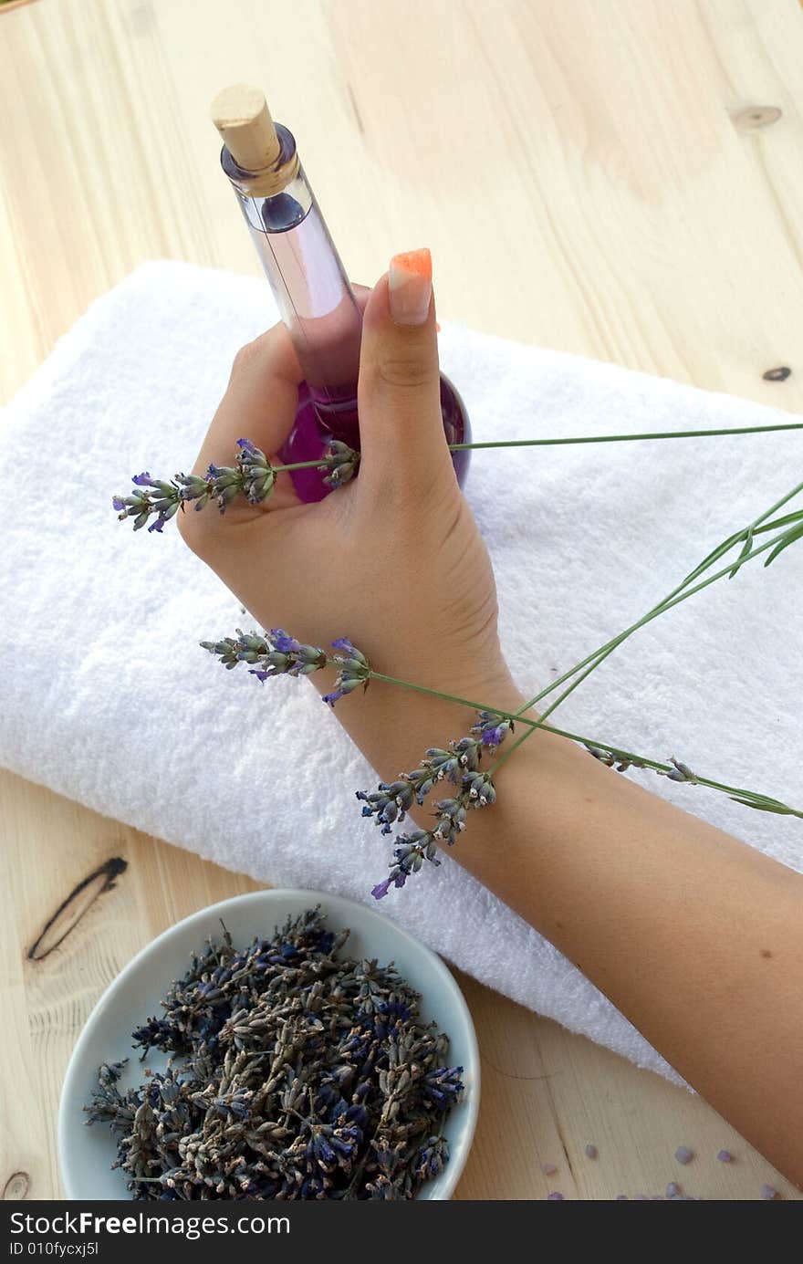 Women with lavender and medical herbs.