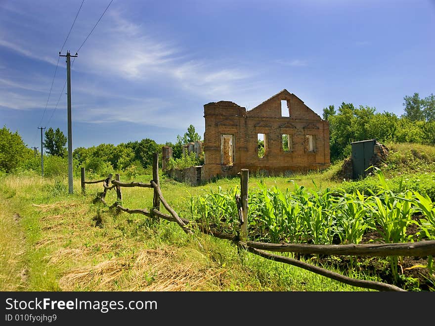 Rural landscape with an ancient brick wall in Ukraine