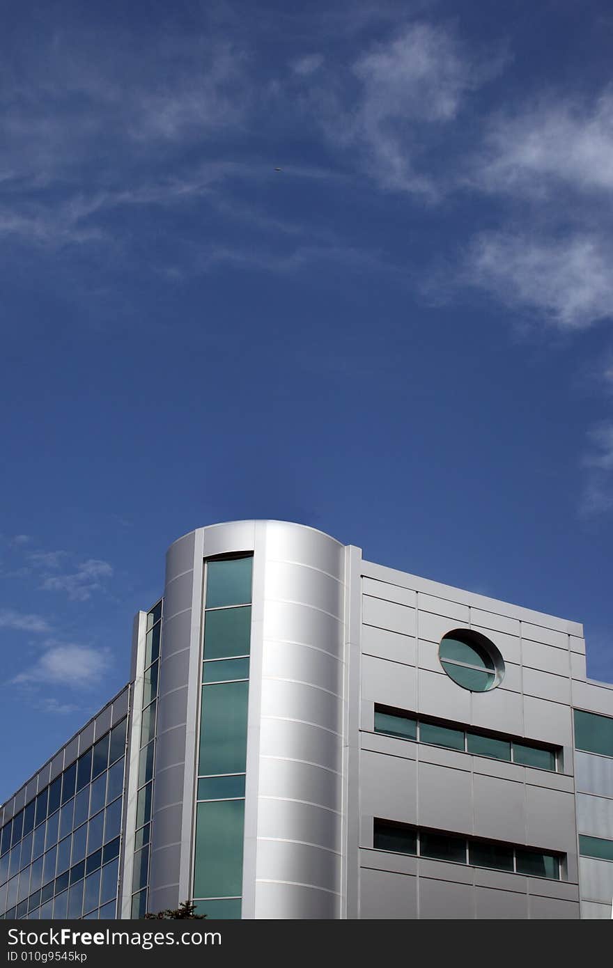 Detail of modern building on blue sky background