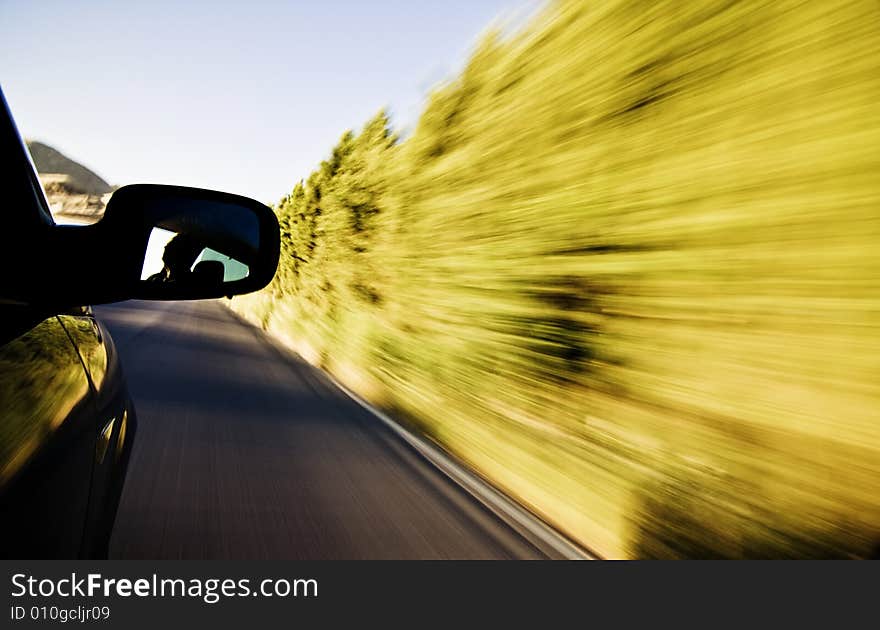 Abstract blurred action from car at high speed.