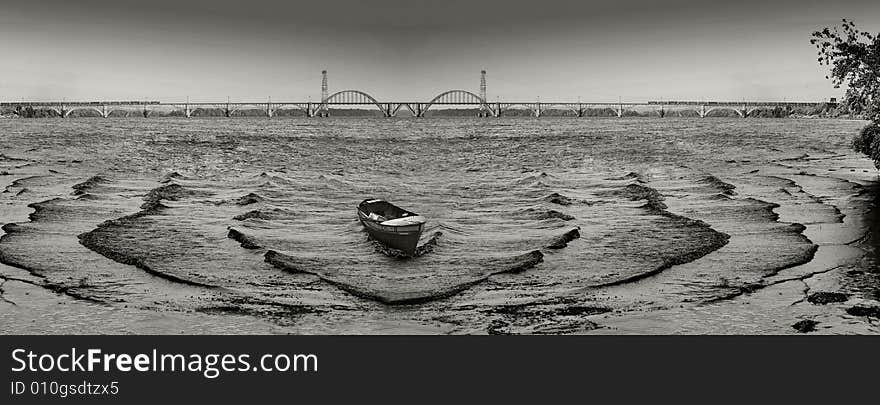 Rhythm of waves and abandoned boat