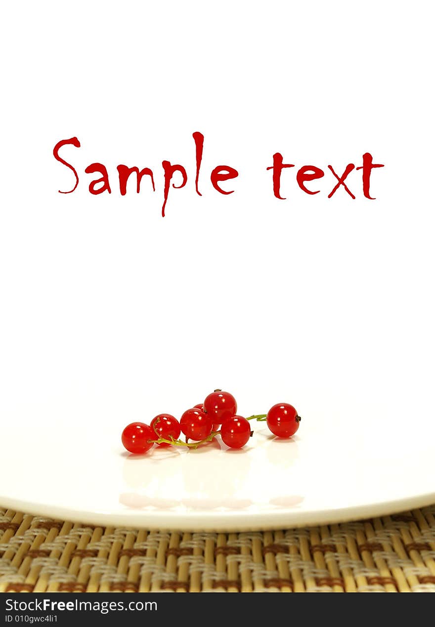 Red Currant On A White Plate