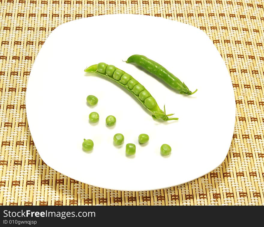 Ripe pea isolated on a white background