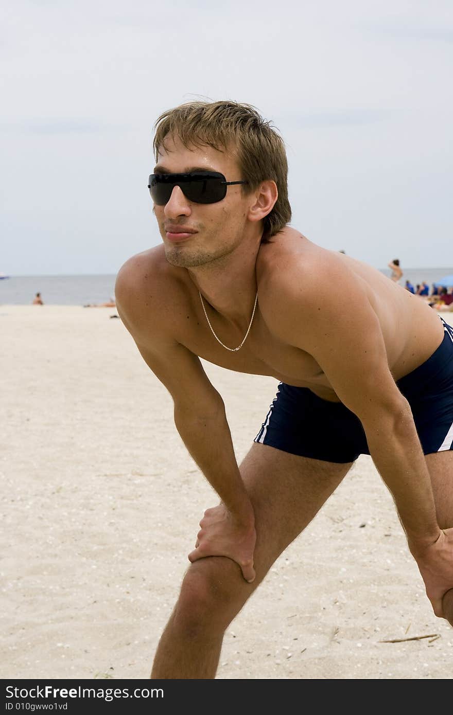 Man playing volleyball on the beach. Man playing volleyball on the beach