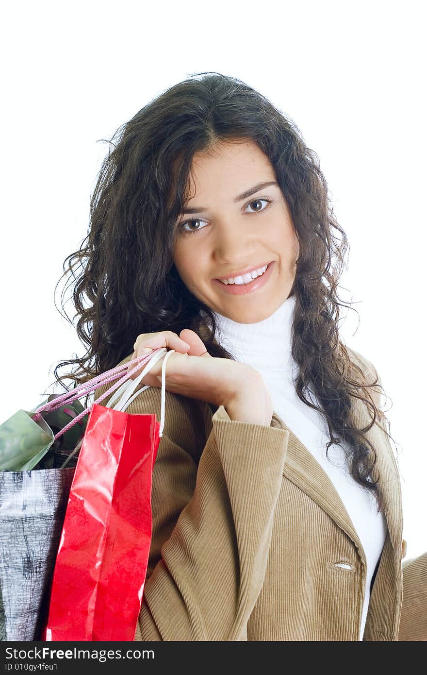 Attractive young happy lady with shopping bags, isolated on white background. Attractive young happy lady with shopping bags, isolated on white background