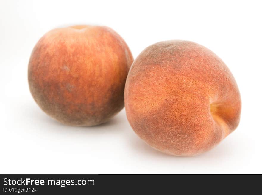 Peaches isolated on white background