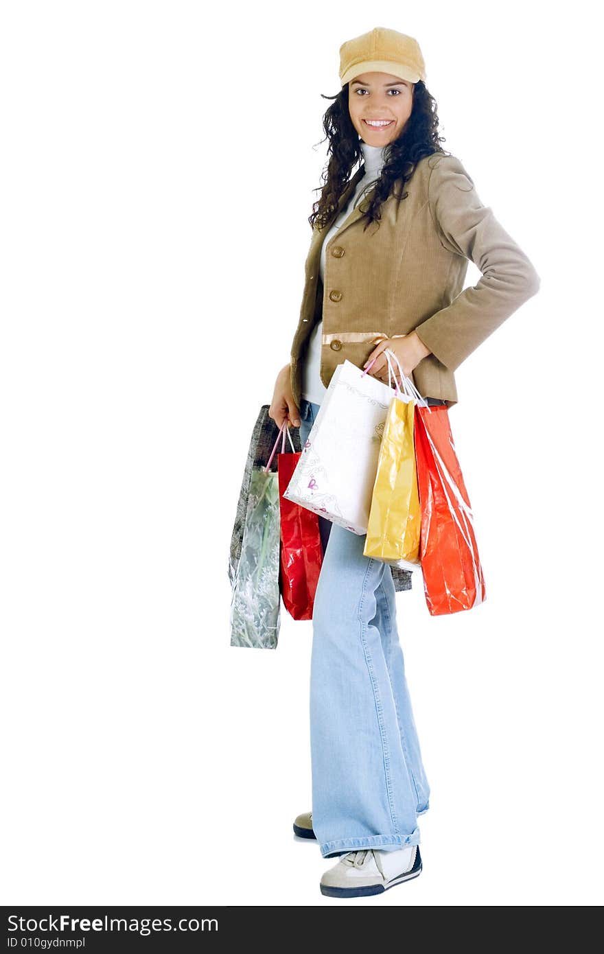 Attractive young happy lady with shopping bags, isolated on white background. Attractive young happy lady with shopping bags, isolated on white background