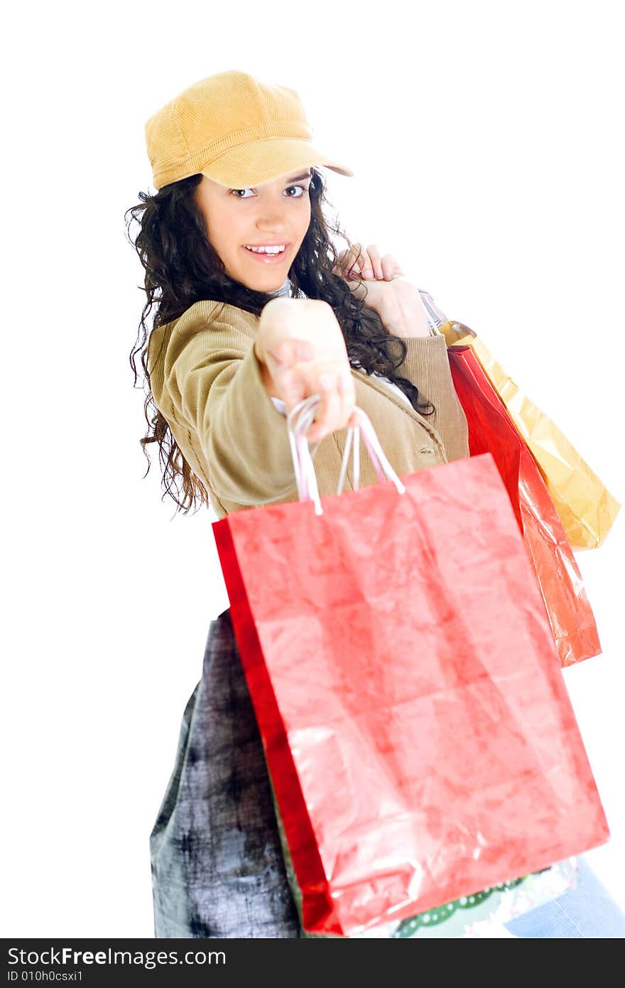 Attractive young happy lady with shopping bags, isolated on white background. Attractive young happy lady with shopping bags, isolated on white background