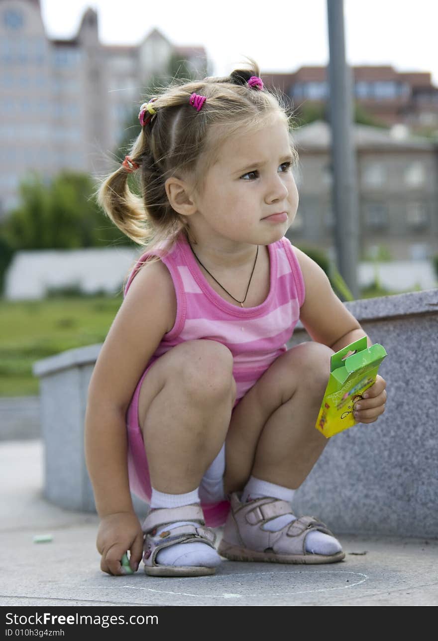 A little cute girl playing