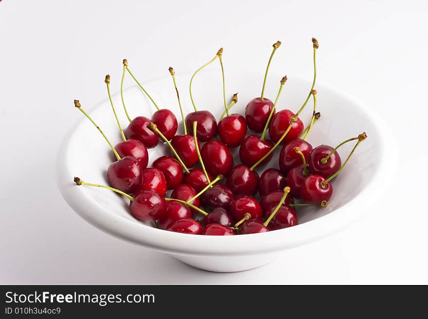 Red cherries in a bowl